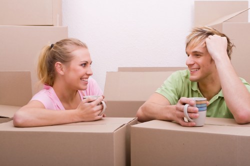 Professional movers loading a van for a Kingston house relocation