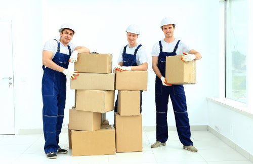 Furniture and boxes being loaded for a Kingston upon Thames van service