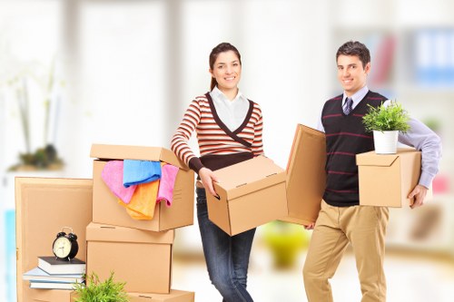Packed moving boxes and protective wrapping for a home relocation