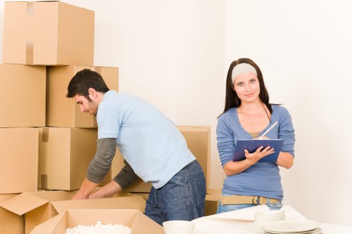 Loading furniture and boxes into a local removal van