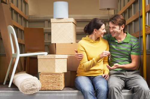 Local house moving team handling furniture in Kingston
